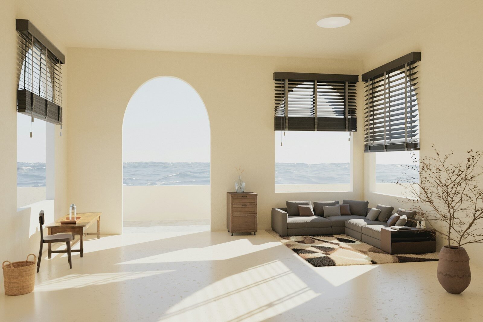A living room filled with furniture and large windows